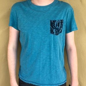 Blue shirt with patterned pocket